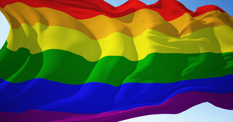 LGBTQ flag waving in the wind