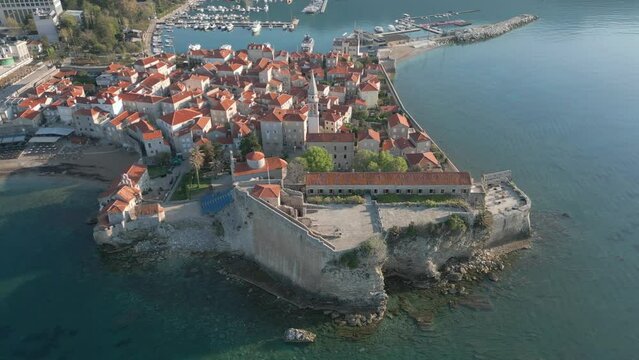 The old town of Budva shot from a drone. The best sights of Montenegro. Budva Old Town fantastic footage from above. Aerial view.