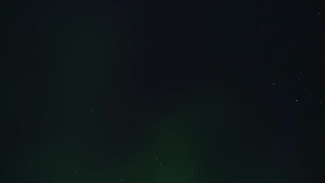 Overhead Aurora Borealis (Northern Lights) shining with colorful lights in the night sky. Timelapse. 