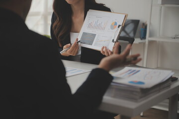 Business Documents, Auditor businesswoman checking searching document legal prepare paperwork or report for analysis TAX time,accountant Documents data contract partner deal in workplace office