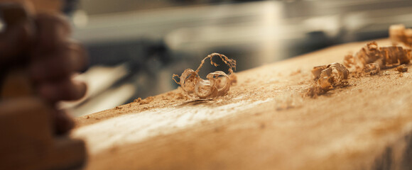Woodworking scene, focused on shaving