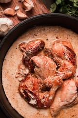 Shkmeruli, fried chicken, in milk-garlic sauce, Georgian cuisine, homemade, close-up, no people,