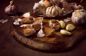 Fototapeta na wymiar Fresh garlic, on a dark background, top view, food concept,