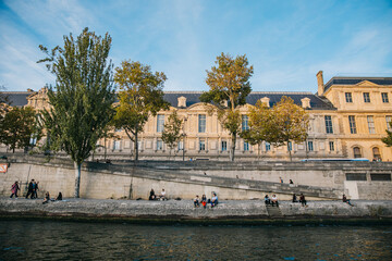 Looking Out across the Seine river to the riverbank and buildings on a clear day