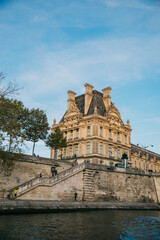 Looking Out across the Seine river to the riverbank and buildings on a clear day