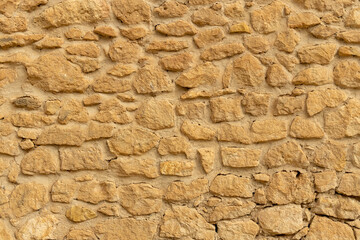 Texture of a stone wall. Old castle stone wall texture background. Stone wall as a background or texture. Part of a stone wall, for background or texture