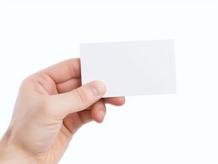 Obraz premium Hand holding blank business card isolated on white background