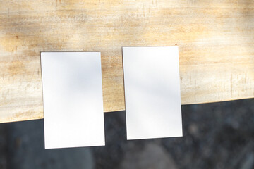 Blank white business card mockup on wood background. For your business card design. Corporate Stationery, Branding Mock up.