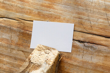 Blank white business card mockup on wood background. For your business card design. Corporate Stationery, Branding Mock up.