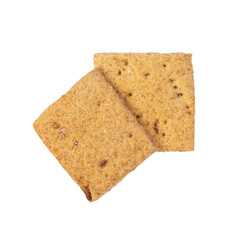 Two square crackers. Carbohydrate snack. Isolated on white background.
