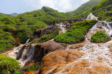 Jinguashi golden waterfall in New Taipei city of Taiwan
