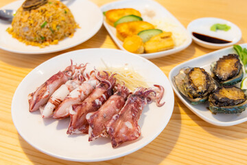 Chinese style seafood arranged dishes in restaurant