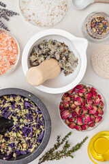 Preparation of homemade cosmetics and aroma bath salt. Zero waste, eco friendly diy beauty products ingredients on light background, flat lay, top view