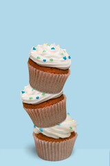 Sugar sprinkles on tasty sweet cupcakes