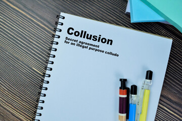 Concept of Definition Collusion word write on paperwork isolated on Wooden Table.