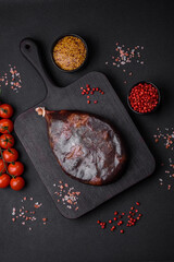 Tasty mahan, prosciutto or jamon on a wooden cutting board