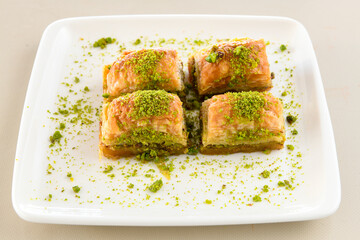 Turkish Dessert Sobiyet Baklava, mussels baklava and classic baklava with Pistachio . Didye, Cevizli, Fistikli Baklava, top view.