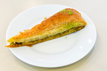 Turkish Dessert Sobiyet Baklava, mussels baklava and classic baklava with Pistachio . Didye, Cevizli, Fistikli Baklava, top view.