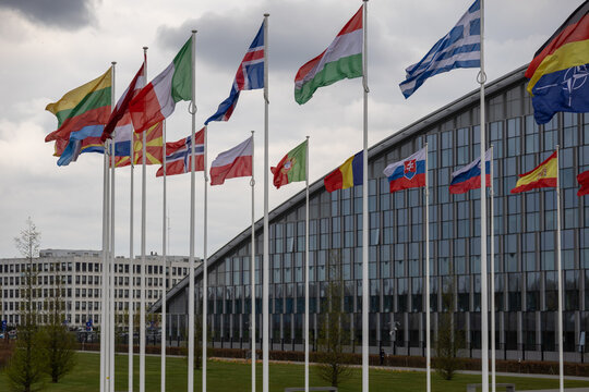 The national flags of countries member of the NATO fly outside the organisation headquarters in Brussels, Belgium on April 20 2023.