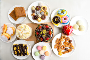 Turkish Dessert Sobiyet Baklava, mussels baklava and classic baklava with Pistachio . Didye, Cevizli, Fistikli Baklava, top view.