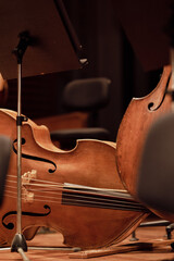 An acoustic double bass on a symphony orchestra stage
