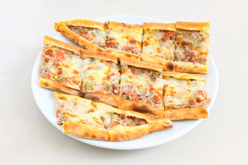 Kiymali pide. Turkish pide with minced meat. Turkish pizza mince pita Pide on white background. Etli ekmek. Kusbasi kasarli pide.