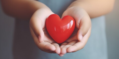 Child hands holding red heart,health care, donate and family insurance concept,world heart day, world health day, CSR responsibility, adoption foster family, hope, gratitude, kind, generative ai
