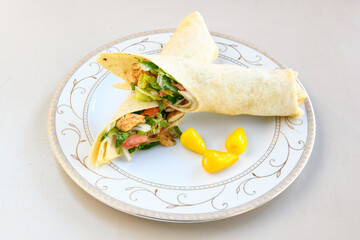 Lavash zurna doner kebab ( zurna  durum )  or shawarma sliced in plate isolated.  hatay usulu tavuk Et doner durum. Gobit ekmek arasi doner. Pilavustu iskender doner kebap. 