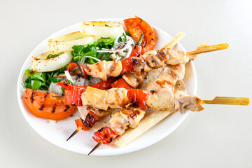 Chicken wings barbeque in a dish with BBQ grill sauce . Izgara tavuk kelebek sis kanat. Tavuk sis, gogus.