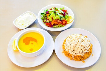 Traditional delicious Turkish food; Turkish style rice pilaf (Turkish name; Arpa sehriyeli. tavuk, kuru fasulyeli, pirinc pilavi)