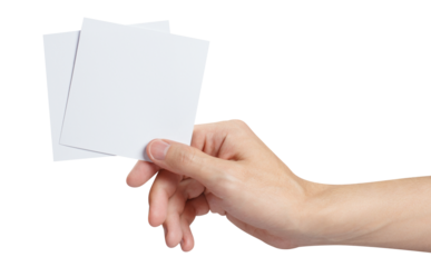 Male hand holding two square blank sheets of paper (tickets, flyers, invitations, coupons, etc.), cut out
