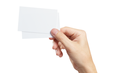 Hand holding two small pieces of paper or plastic (cards, tickets, flyers, invitations, coupons, banknotes, etc.), cut out