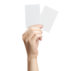 Hand holding two small pieces of paper or plastic (cards, tickets, flyers, invitations, coupons,...