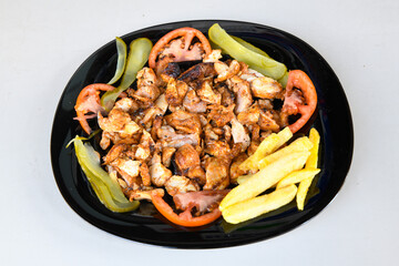 Turkish and Arabic Traditional Ramadan doner kebab with tasty tomato sauce and rice or turkish...