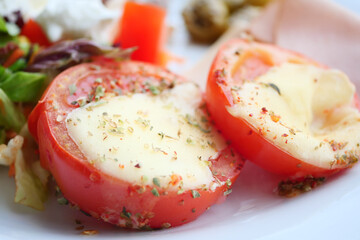 Tomatoes stuffed with cheese from the oven
