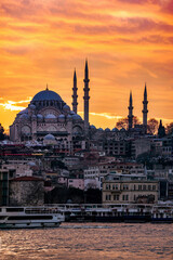 Sunset in Istanbul, Turkey with Suleymaniye Mosque (Ottoman imperial mosque). View from Galata Bridge in Istanbul. TURKEY