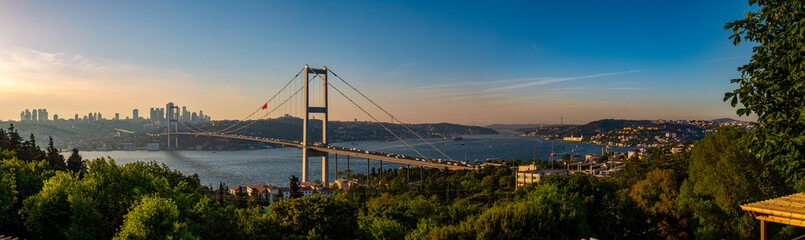 Istanbul Bosphorus panoramic photo. Istanbul landscape beautiful sunset with clouds Ortakoy Mosque,...