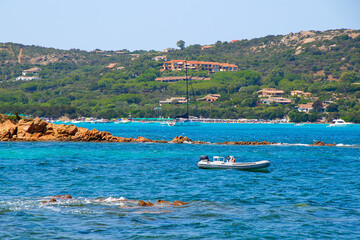 Obraz premium Inflatable dinghy moored in the bay of Porto Istana on the (