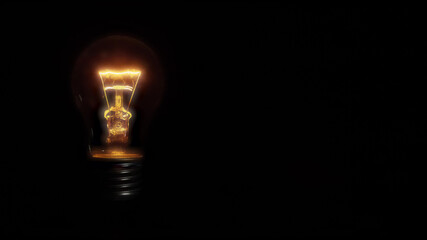 incandescent light with voltage drop bulb on black background