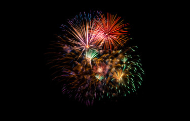 Dazzling fireworks light up the night sky, celebrating with a vivid display, shallow depth of field, Illustrative Generative AI