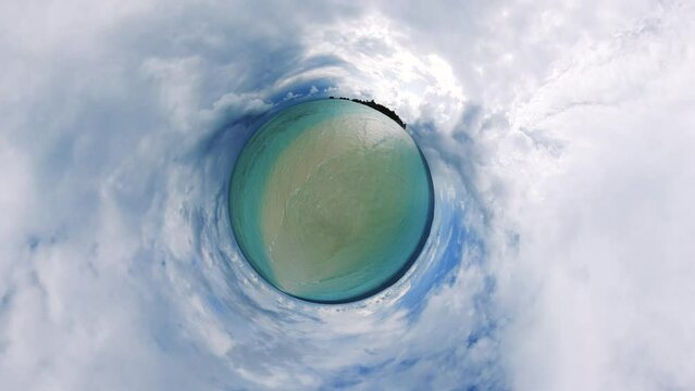 Little Tiny Planet 360 Degree Footage of a sandbank on a paradise island at the Maldives on a cloudy day