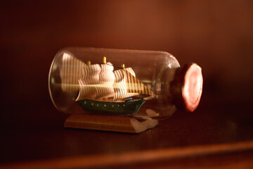 A miniature ship in a glass jar