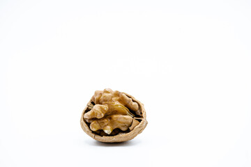 Walnuts in a shell on a white background