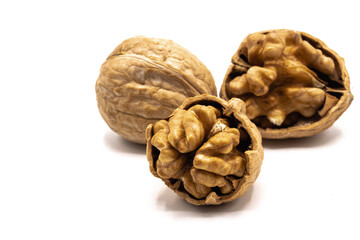 Fototapeta na wymiar Trio of walnuts in a shell 