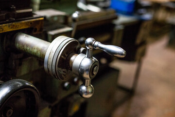 Fototapeta na wymiar metal handle of the milling machine in an industrial plant