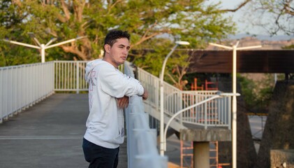 person standing on bridge