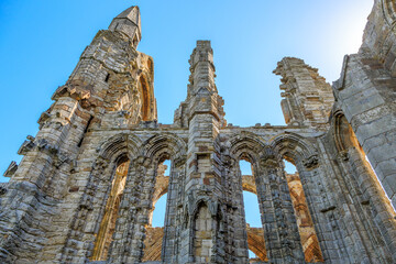 Fototapeta na wymiar England, North Yorkshire, Whitby. North Sea, East cliff. English Heritage site, ruins of Benedictine abbey, Whitby Abbey, monastery.