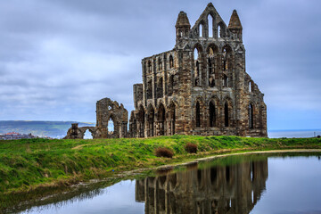 England, North Yorkshire, Whitby. North Sea, East cliff. English Heritage site, ruins of...