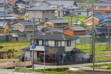 Large houses in quiet Japanese small town in countryside - 595431497