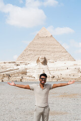 tourist in front of the pyramids of egypt